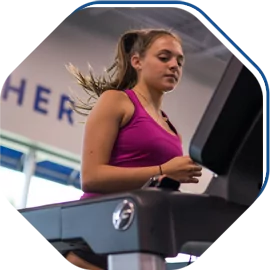 Girl Running on Treadmill at HiTONE Fitness Gym