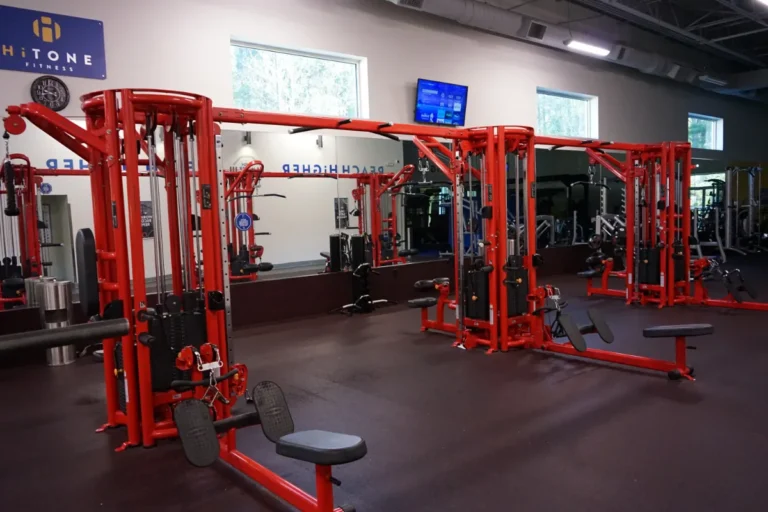 a set of red gym machines.