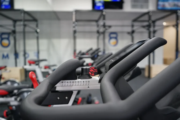 a close up of cardio equipment in a gym.