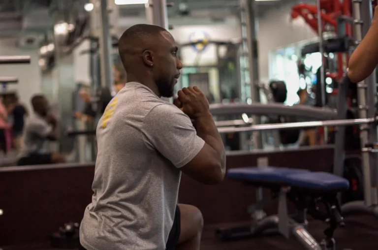 a person stretching in a gym