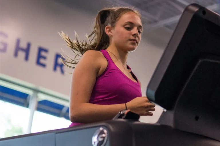 Woman on a treadmill.