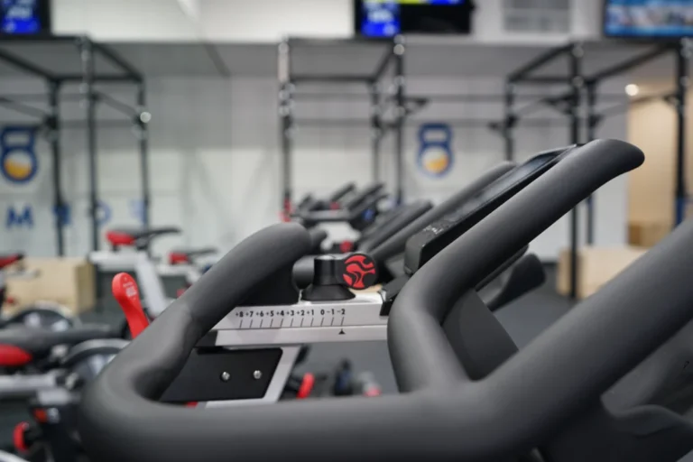 Handles of an exercise machine at a gym.