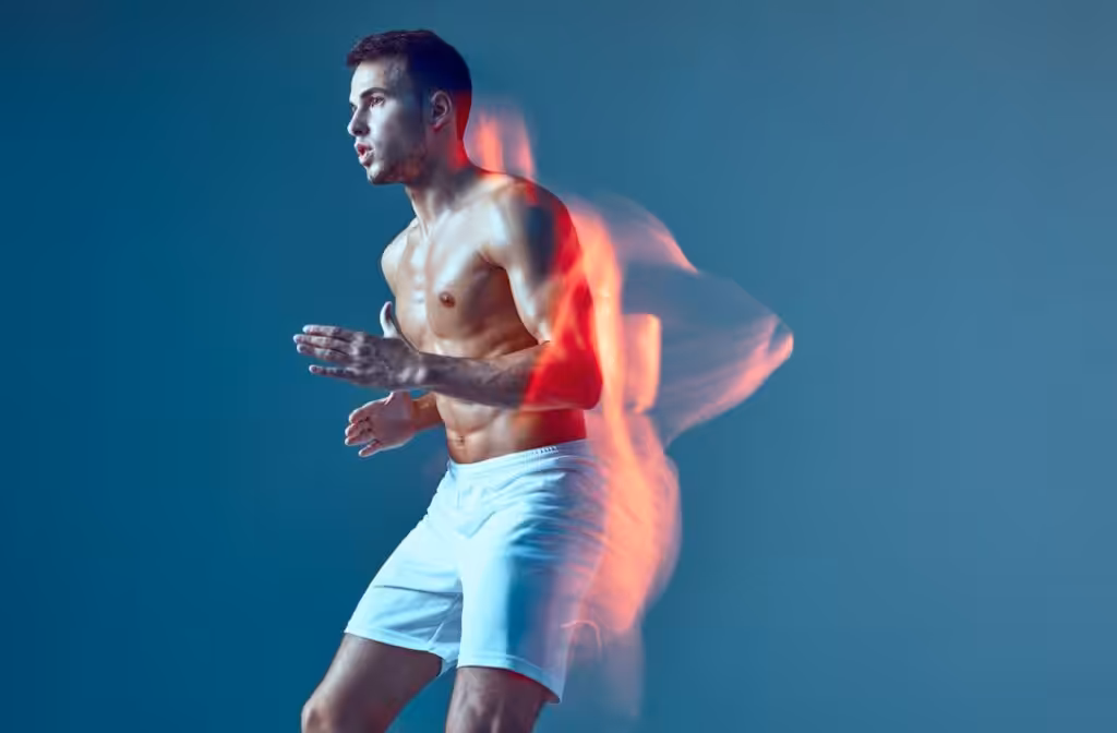 Athletic man running with motion blur effect.