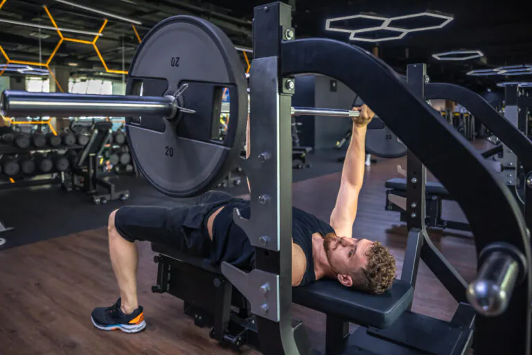 Man lifting weights in a gym